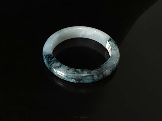 A blue dusk radiance jadeite bangle.
