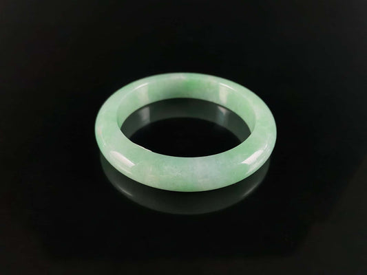 A pale spring green mist jadeite bangle.