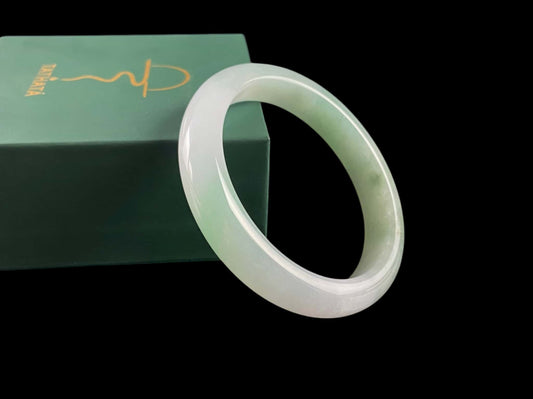 A mint gradient veil jadeite bangle.