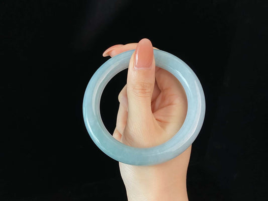 A icy blue calm jadeite bangle.
