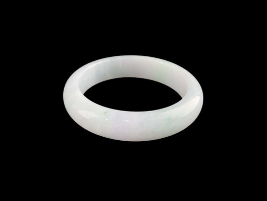 A pristine white with green veil jadeite bangle.