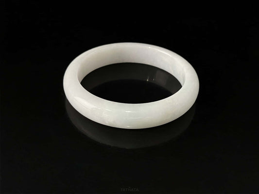 A cloudy milk white jadeite bangle.