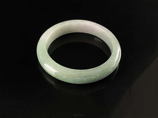 A willow green white veil jadeite bangle.