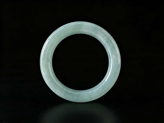 A misty blue dew jadeite bangle.