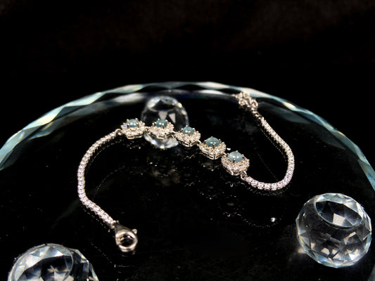 A glacial blue dewy clust jadeite bracelet.