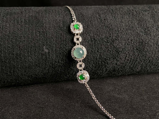 A green aqua fortune link jadeite bracelet.