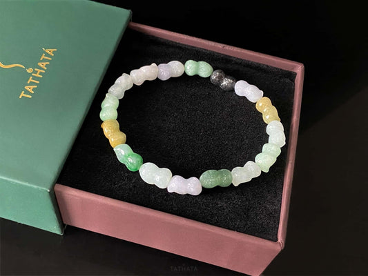 A multi color peanut jadeite beads bracelet.