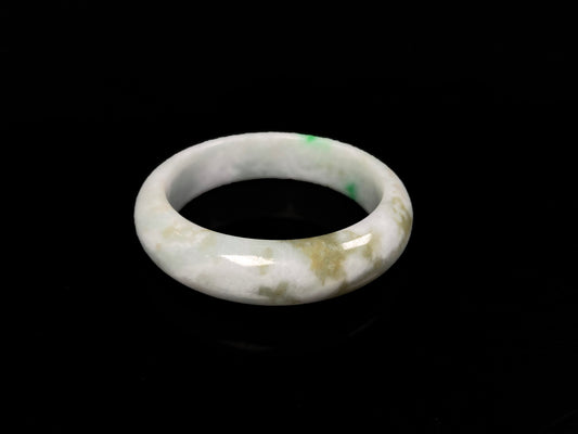 A green sprout jadeite bangle.