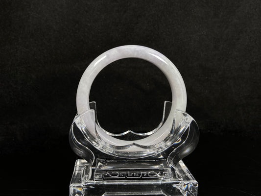 A milky white serenity jadeite bangle.