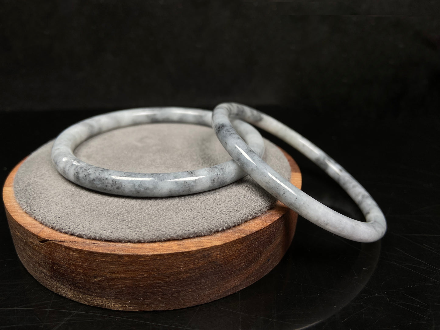 A gray white cloud haze pair jadeite bangle.