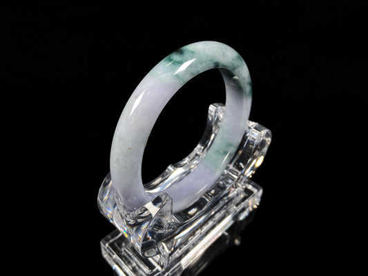 A lavender green mist jadeite bangle.