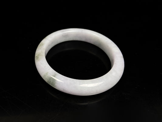 A mossy cloud hush jadeite bangle.