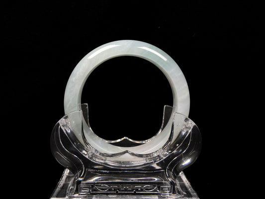 A pale azure cloud white jadeite bangle.