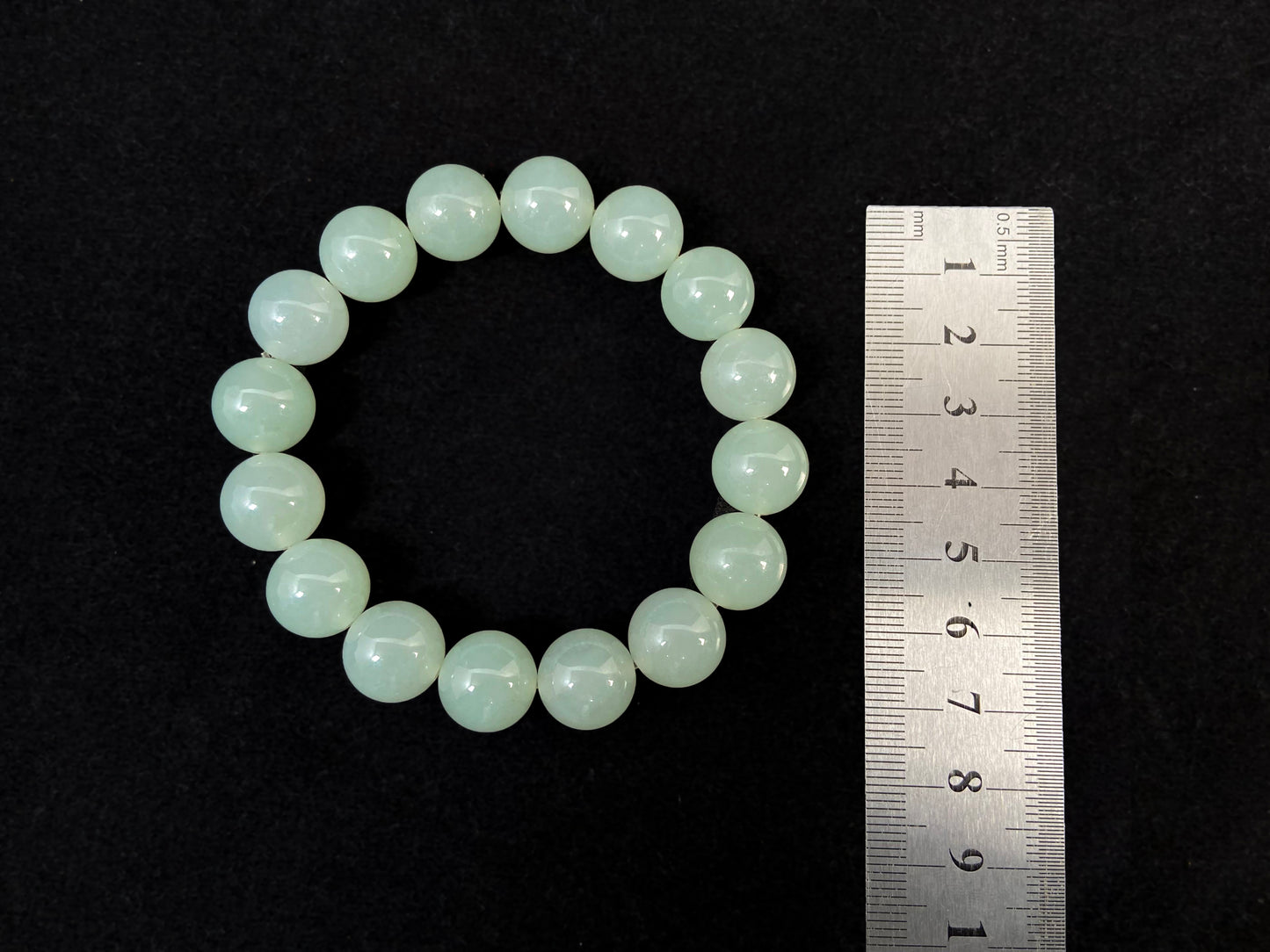 Transparent pale white green jade beads.