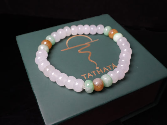 A glacial ice with green and amber accents jadeite beads bracelet.