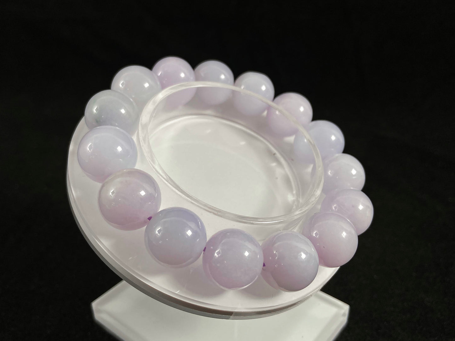 A jade bead strand composed entirely of creamy white beads.