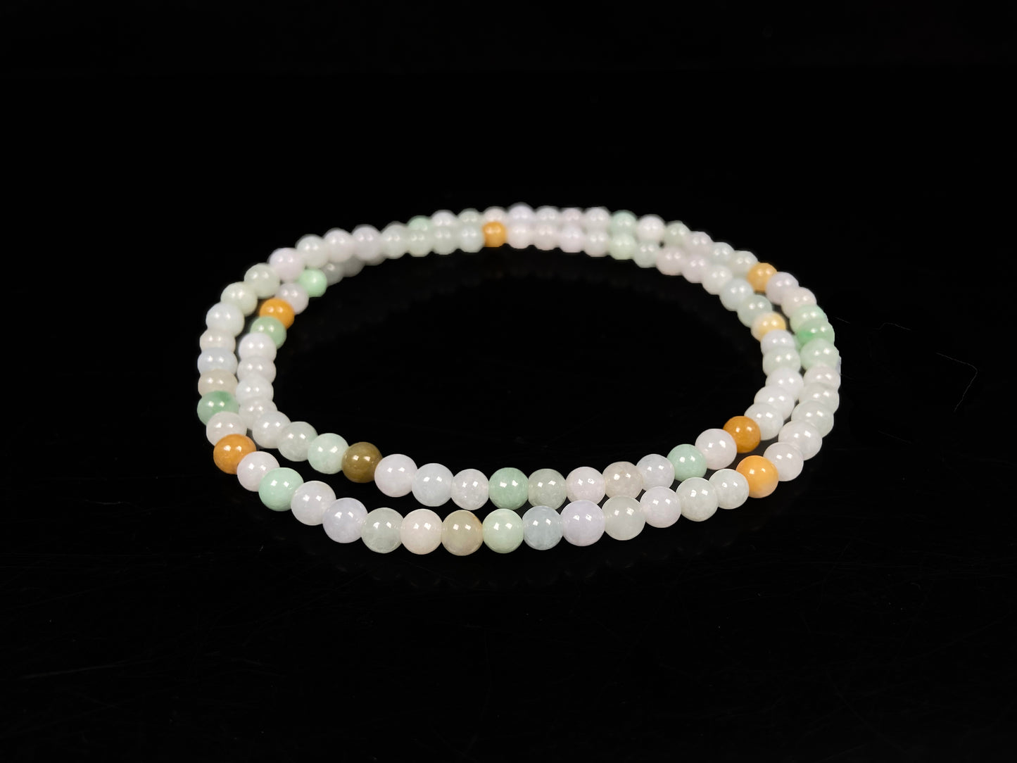 A gentle tri-color harmony jadeite beads bracelet & necklace.