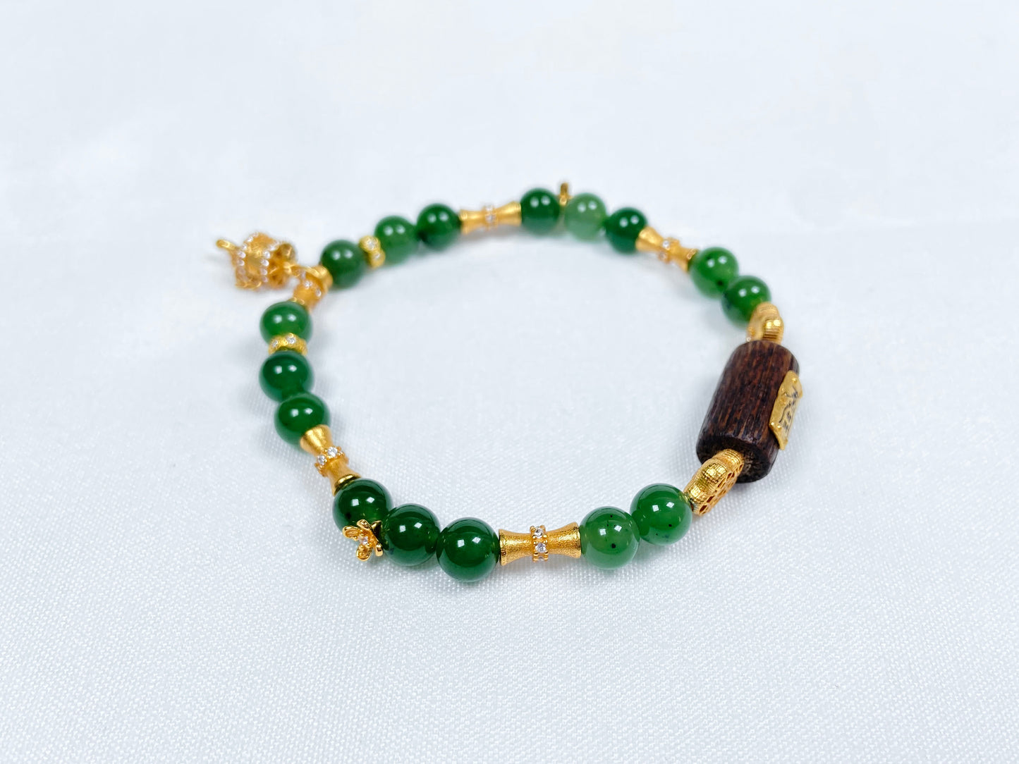 A green Hetian Jade, agarwood, and Wuji jadeite silver bracelet Set.