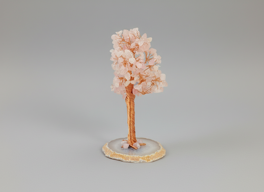 A rose quartz crystal tree.