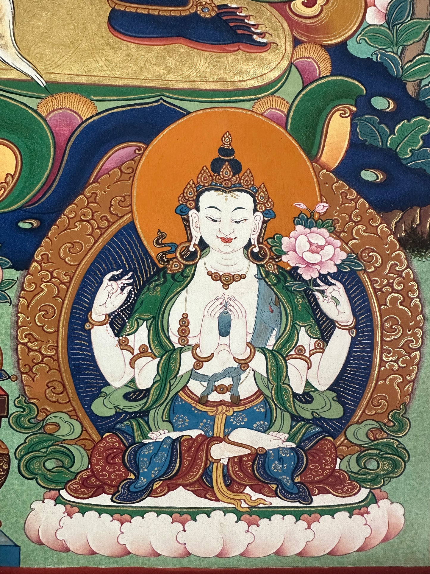 Four-Armed Avalokiteshvara Thangka – Symbol of Compassion and Blessing, hand-painted in traditional Himalayan style.