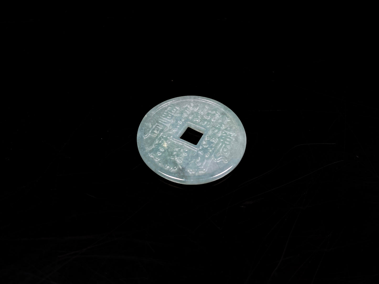 A lucky green ancient coin loose jadeite.