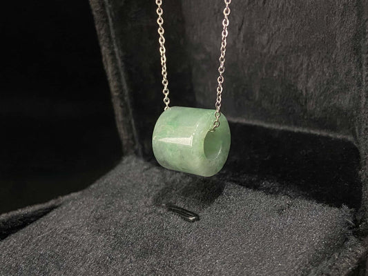 A dewy aqua barrel loose jadeite.