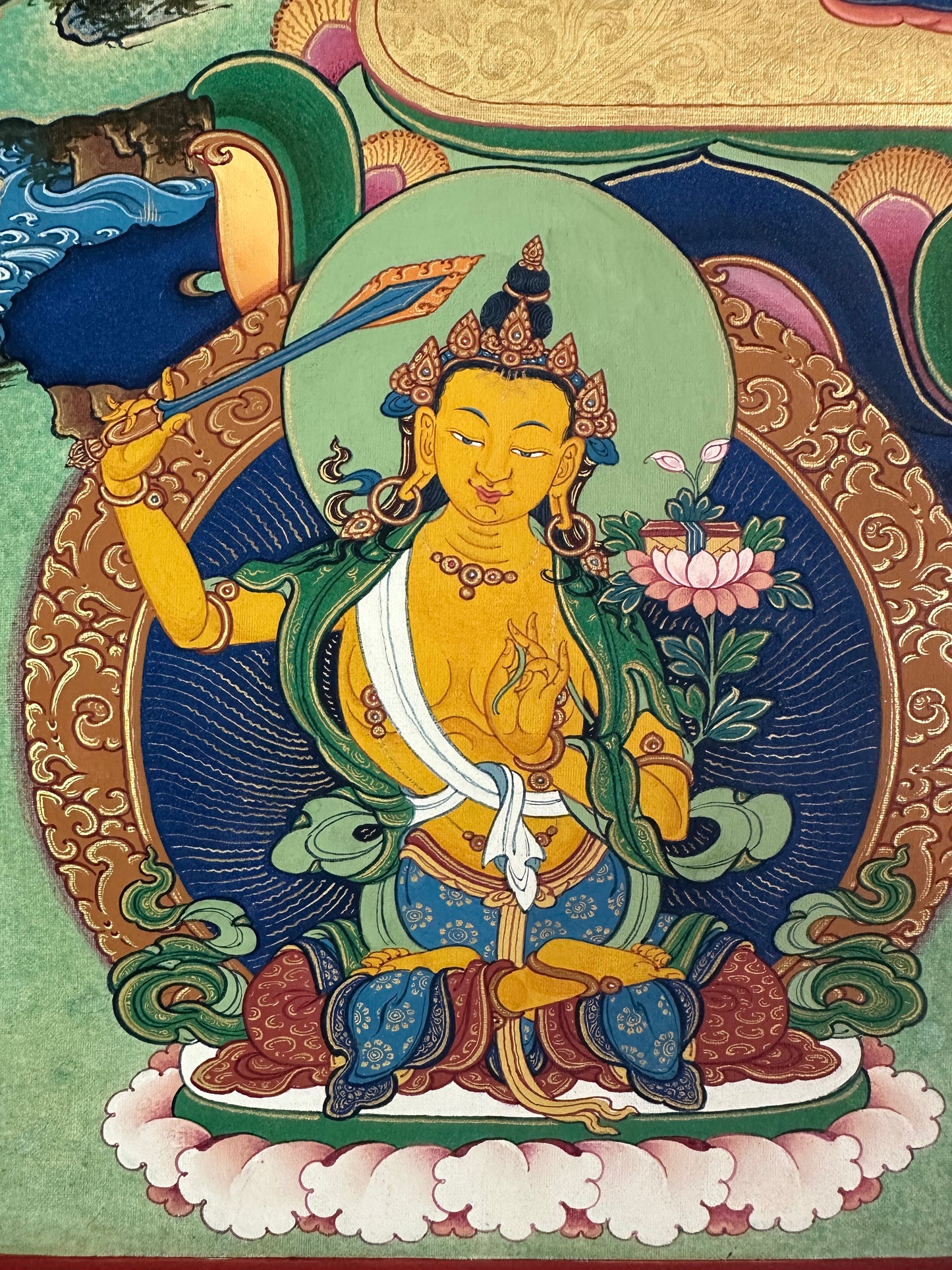 Manjushri Thangka – Embodiment of Transcendent Wisdom, holding the sword of insight and the lotus of scripture.