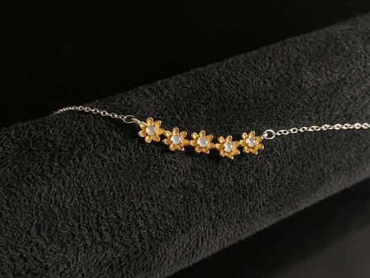 A daisy dew bloom jadeite necklace.
