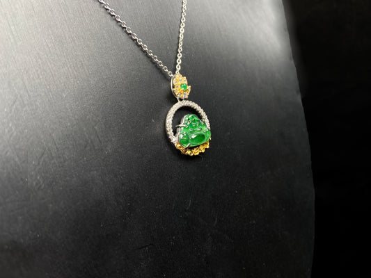 A lotus dual gold buddha jadeite pendant.