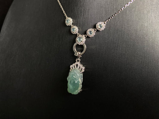 A light green jade Pixiu crowned with a diamond studded 925 silver tiara.