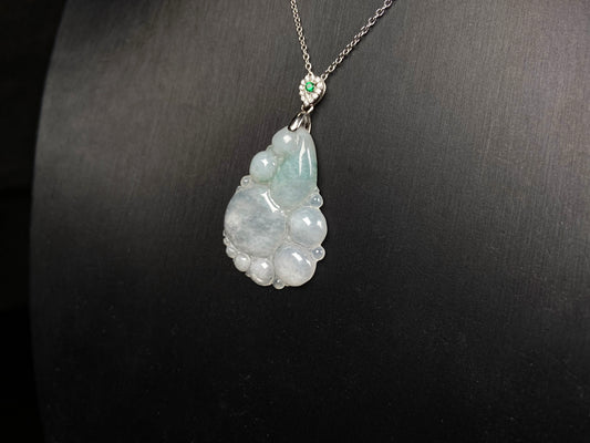 A auspicious dew fortune jadeite pendant.