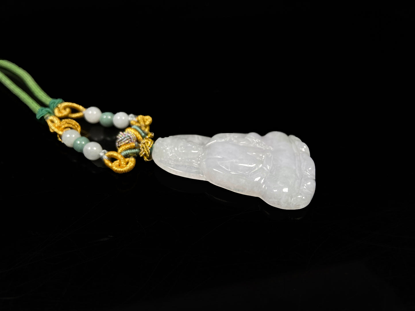 A serene white guanyin jadeite pendant.