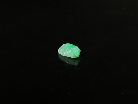 A lush floating green pixiu loose jadeite.