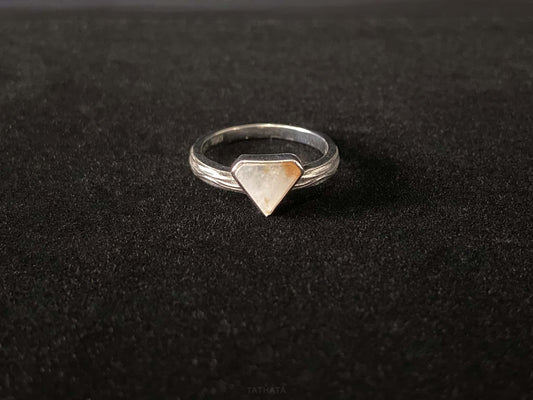 A sunset sugar triangle jadeite ring.