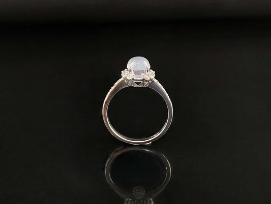 A pale dew drop jadeite ring.