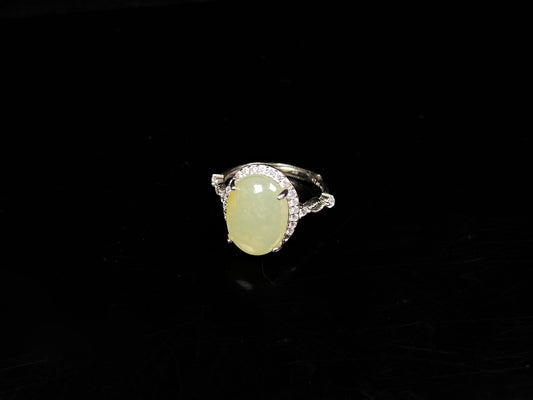 A pale yellow icy clarity jadeite ring.