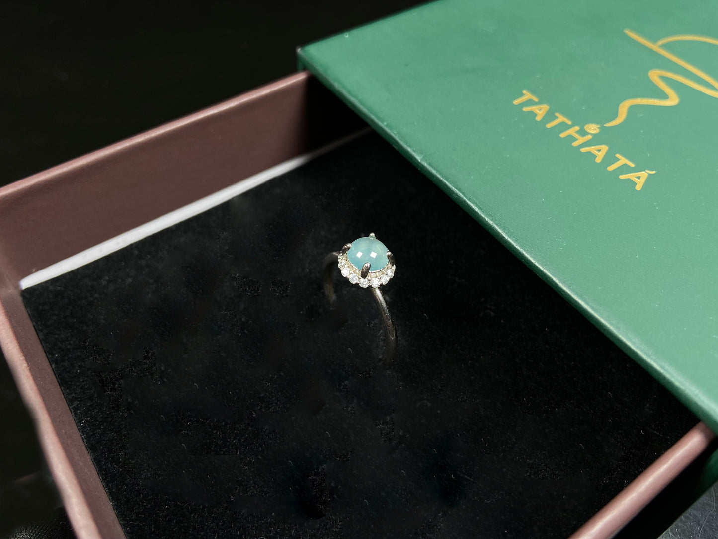 A icy sky blue glow jadeite ring.