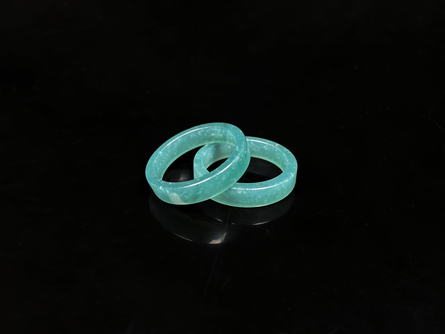 A icy teal mist hush jadeite ring.