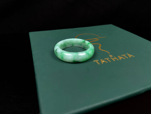 A sloating green soft veil jadeite ring.