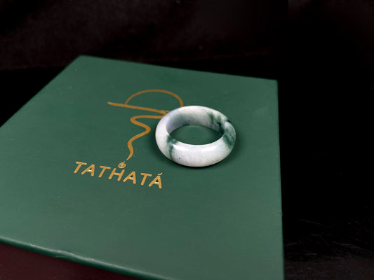 A swirling green ink veil jadeite ring.
