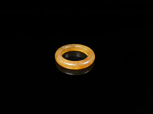 A golden amber glow jadeite ring.