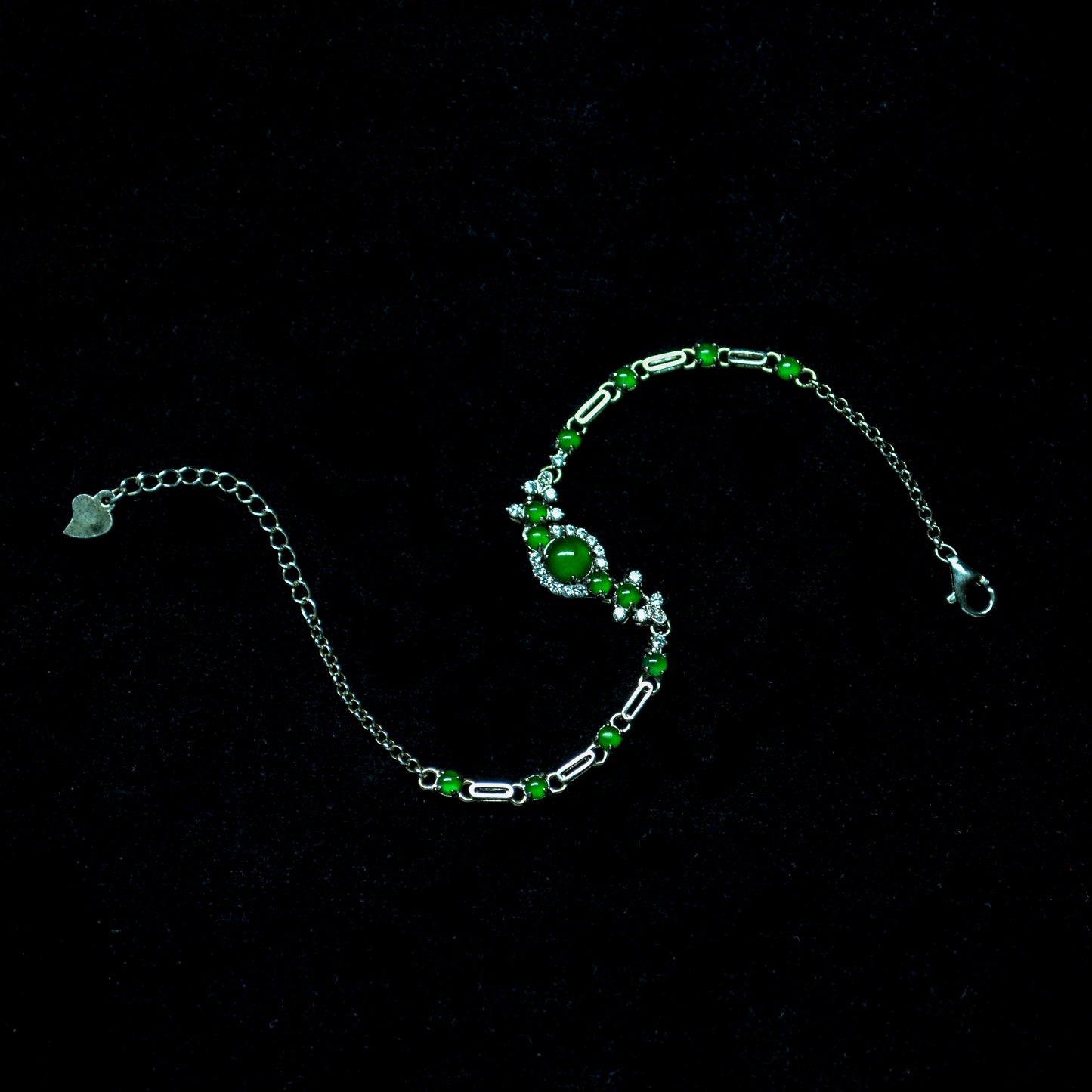 Verdant Muse Jade Silver Bracelet yin-yang shape with spicy green cabochon vivid