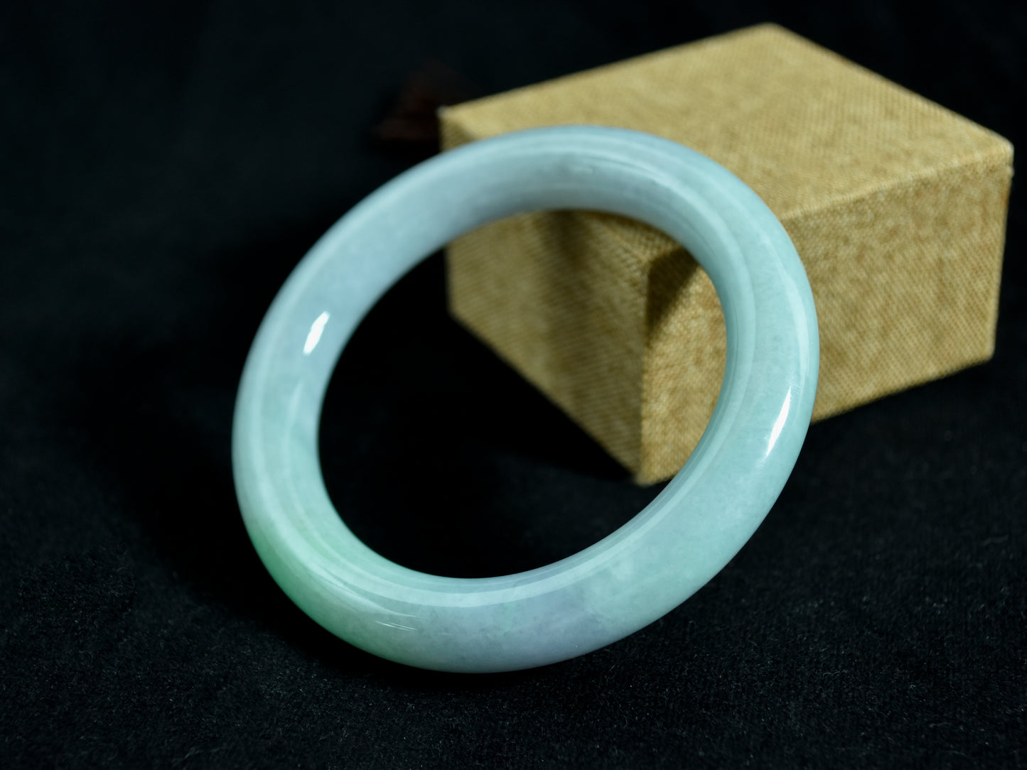 Graceful Echo · Touch of Emerald Jadeite Bangle