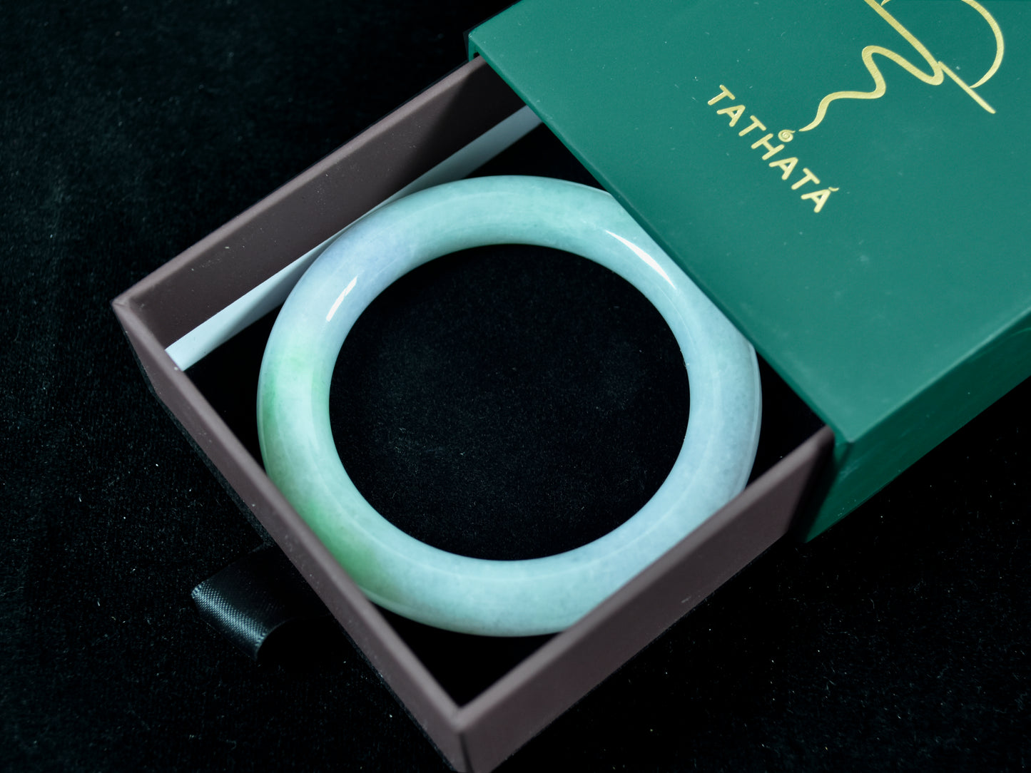 Graceful Echo · Touch of Emerald Jadeite Bangle