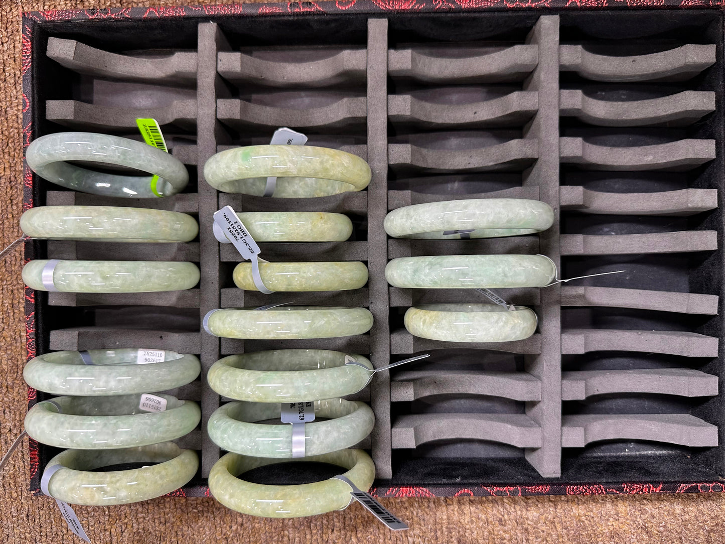 A soothing pea green jade bangle.