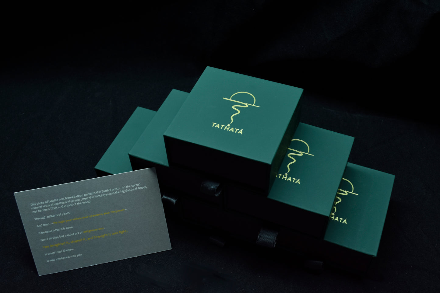 Green boxes with a logo and text on a dark background