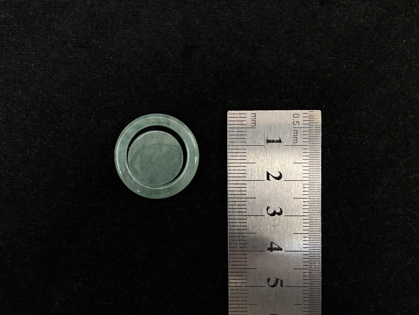 Translucent light green mother-child clasp.