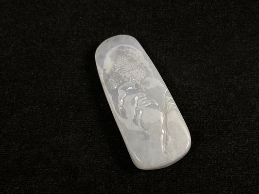 A icy white jadeite landscape plaque.