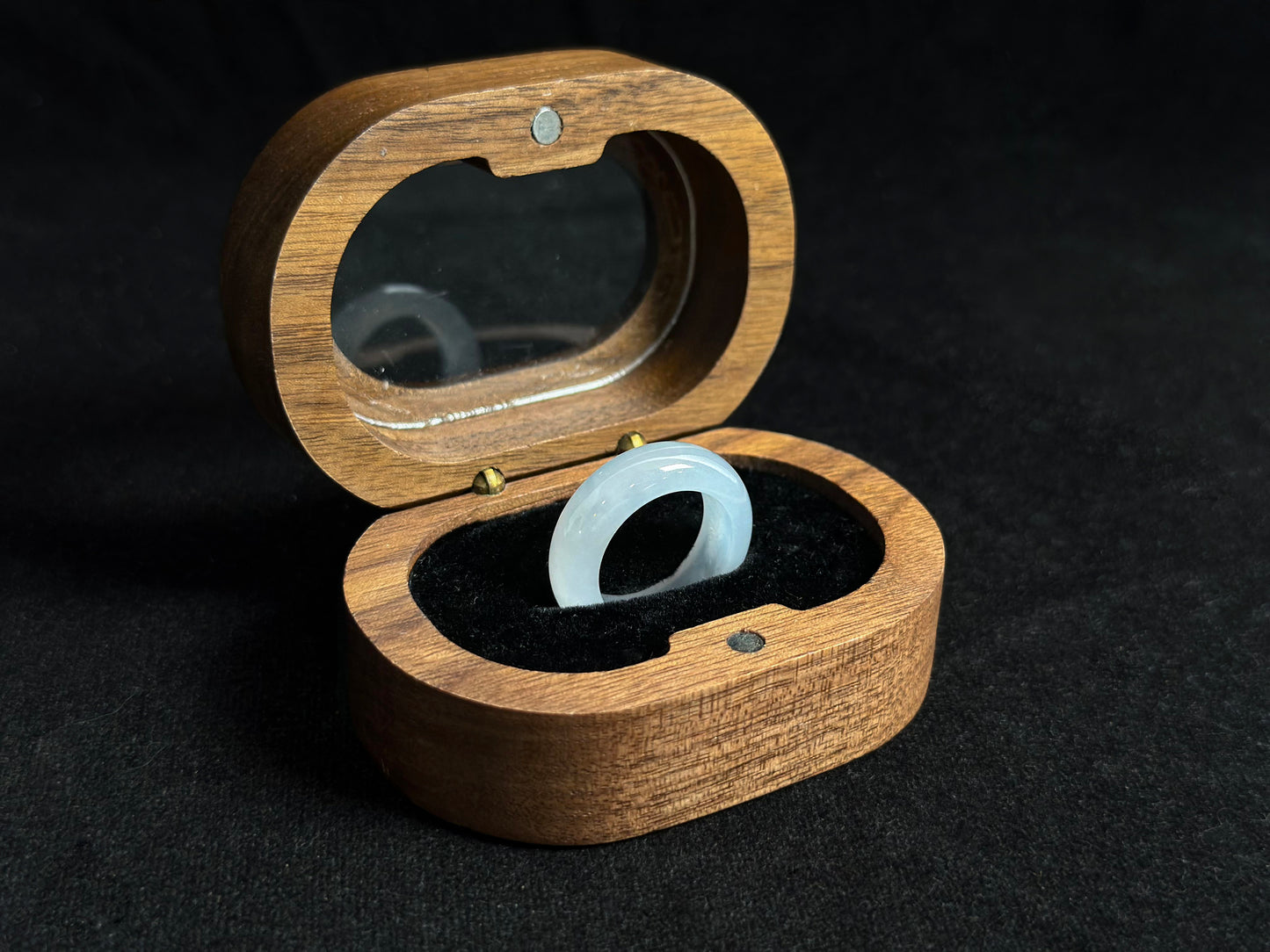 This elegant ring features a white icy jadeite with crystal clear transparency and frost like luminosity.