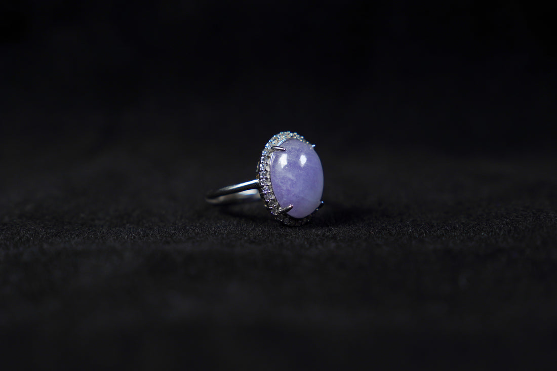 This is a purple cabochon jadeite ring.